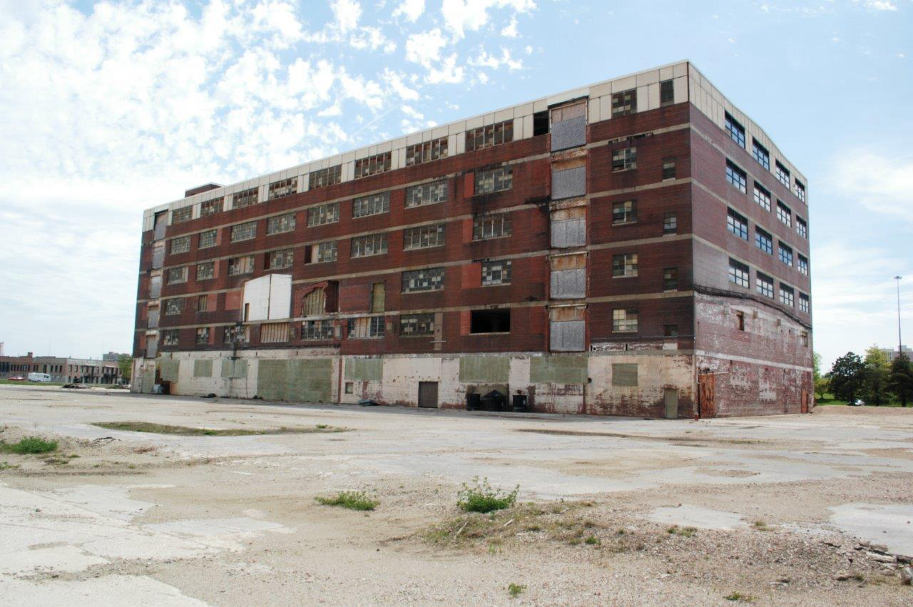 Before — historic brick building exterior, FDP Hotel, Waterloo, Iowa