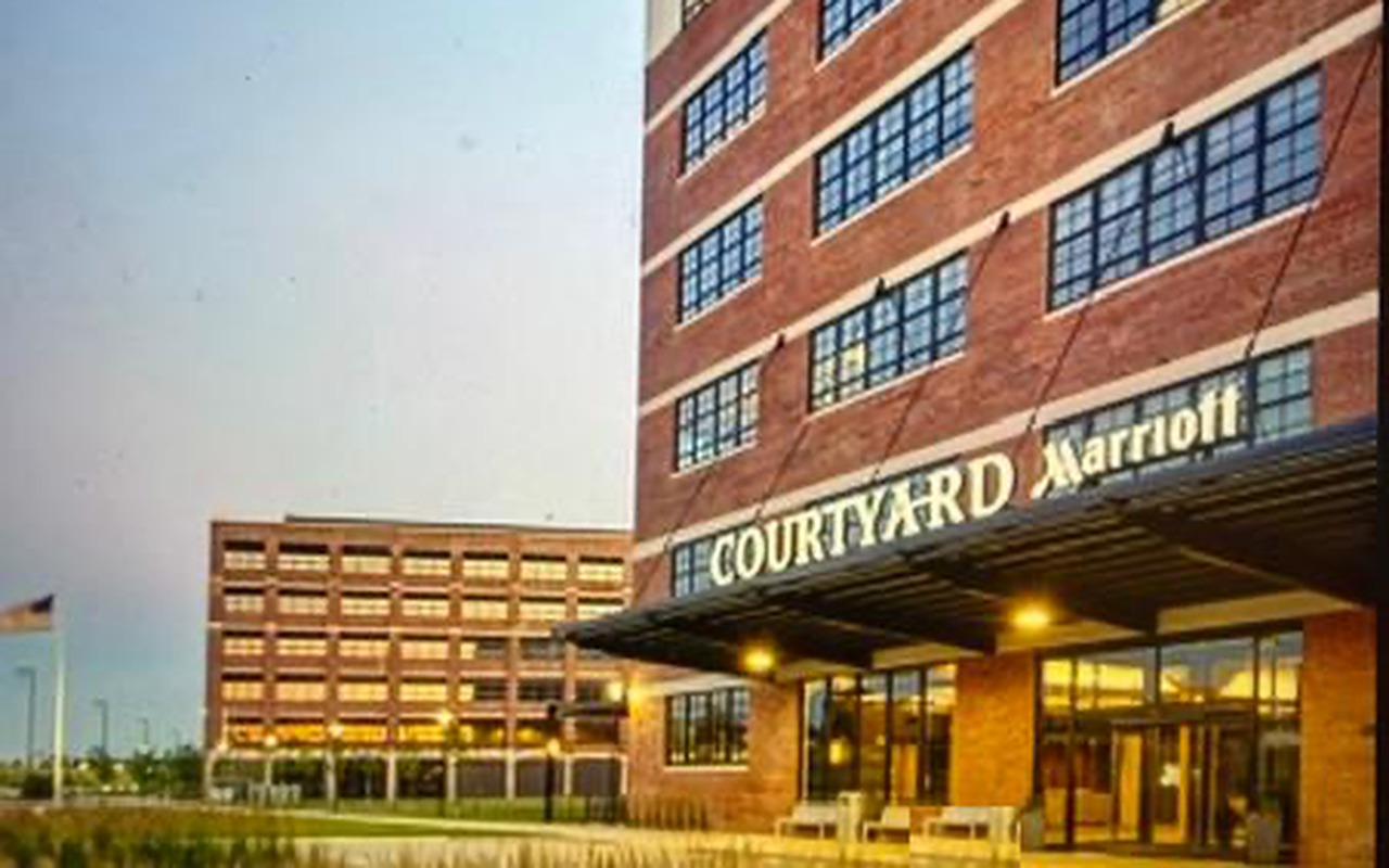 After — Courtyard by Marriott entrance and courtyard at dusk, Waterloo, Iowa