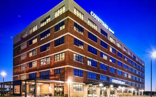 After — Courtyard by Marriott corner view at dusk, Waterloo, Iowa
